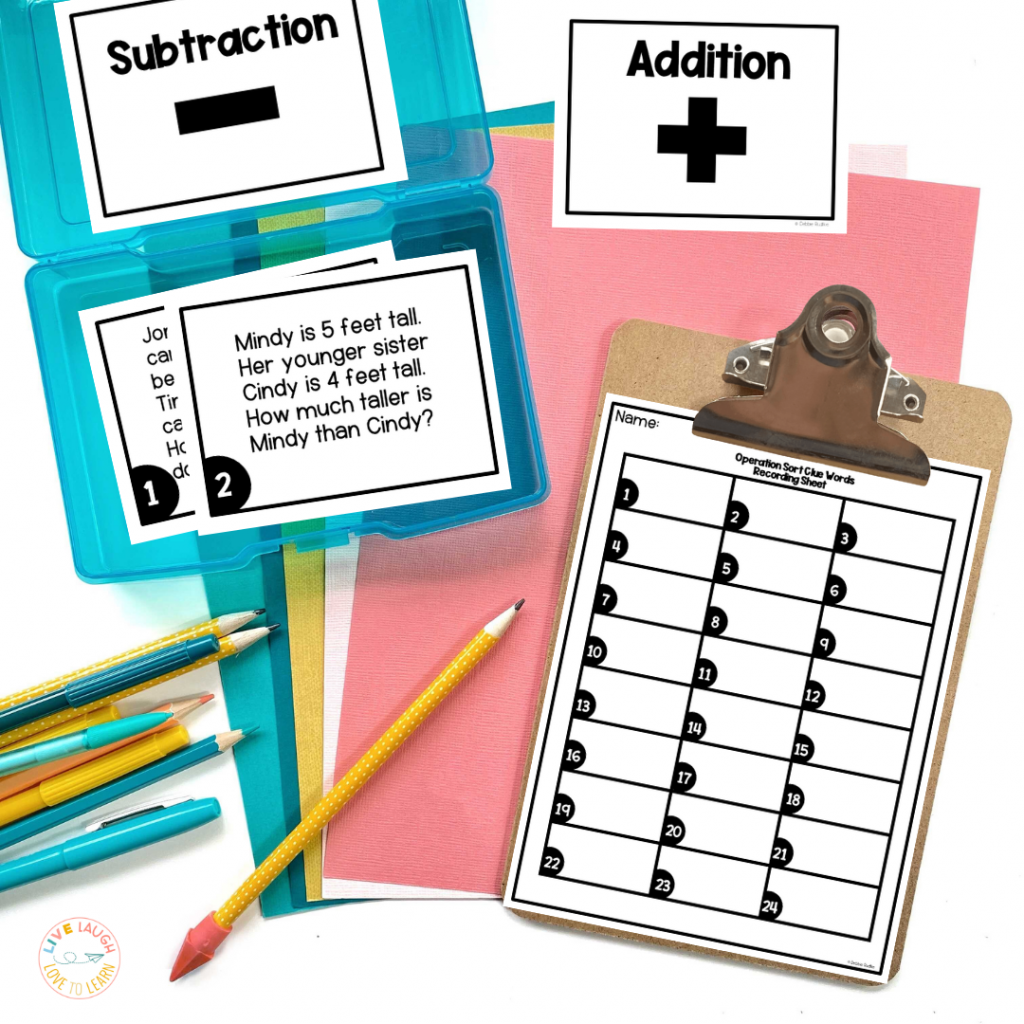 Image of a clipboard with a math recording sheet and a task card box with a math word problem.