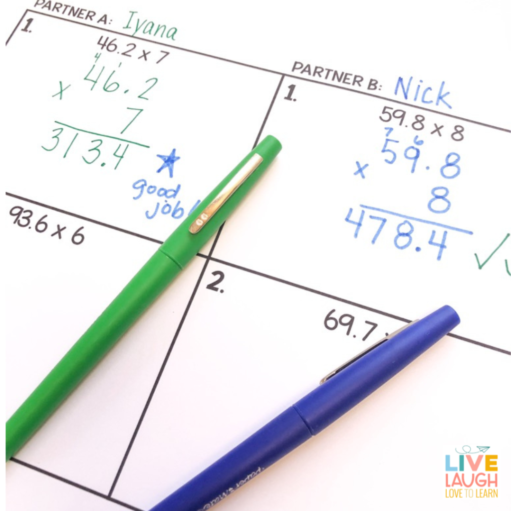close-up image of a math worksheet to multiply decimals by a whole number. The worksheet shows a column of problems for Partner A and a column of problems for partner B.