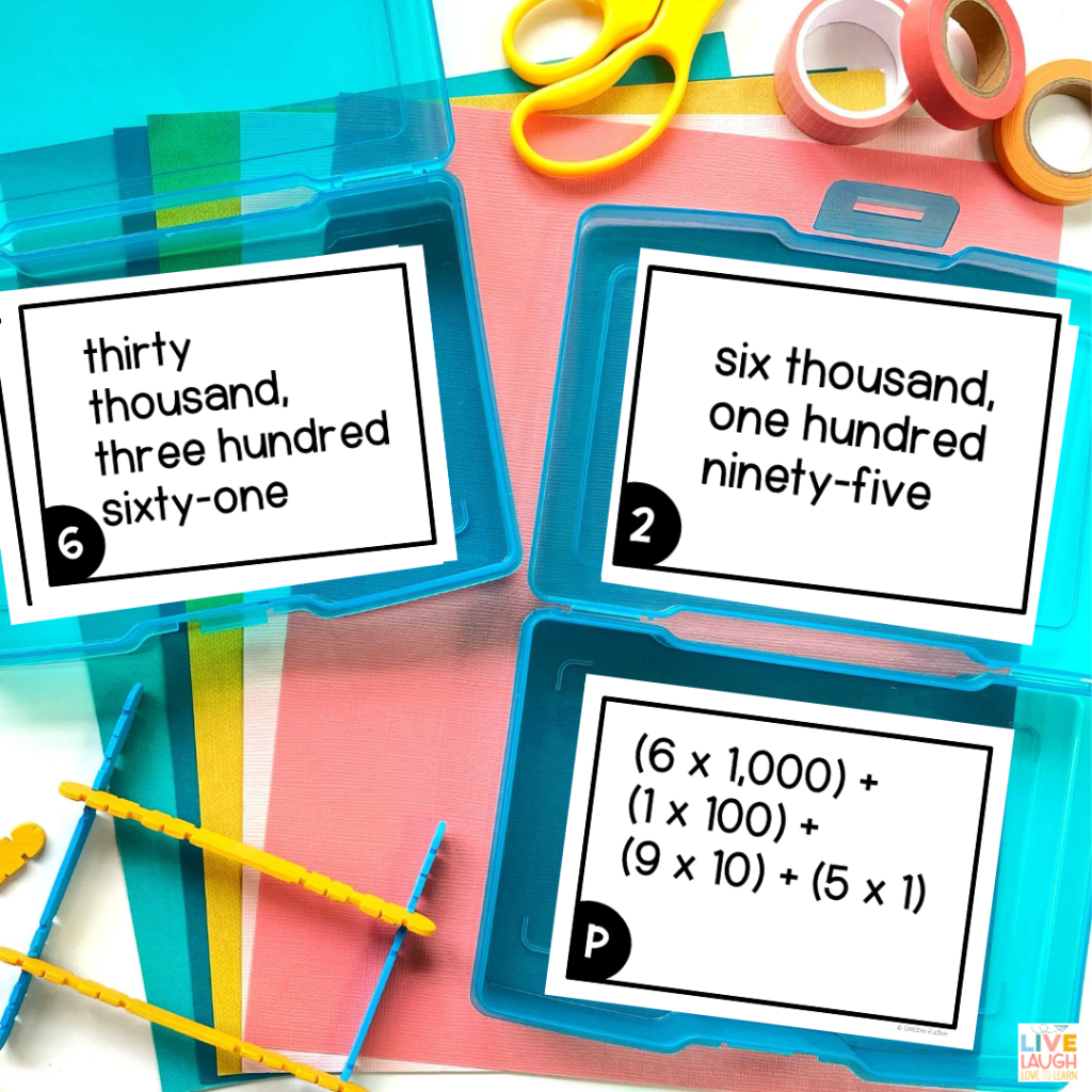 An image of two photo boxes containing place value task cards in word form and expanded notation.