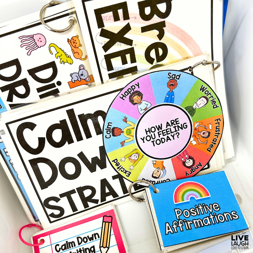 A collection of calm down corner resources, including a colorful emotion wheel labeled 'How Are You Feeling Today?' with illustrated emotions such as happy, sad, worried, and frustrated. The set also features laminated strategy cards on a ring, including 'Calm Down Strategies,' 'Positive Affirmations,' and 'Calm Down Writing,' designed to help students manage their emotions and develop self-regulation skills.