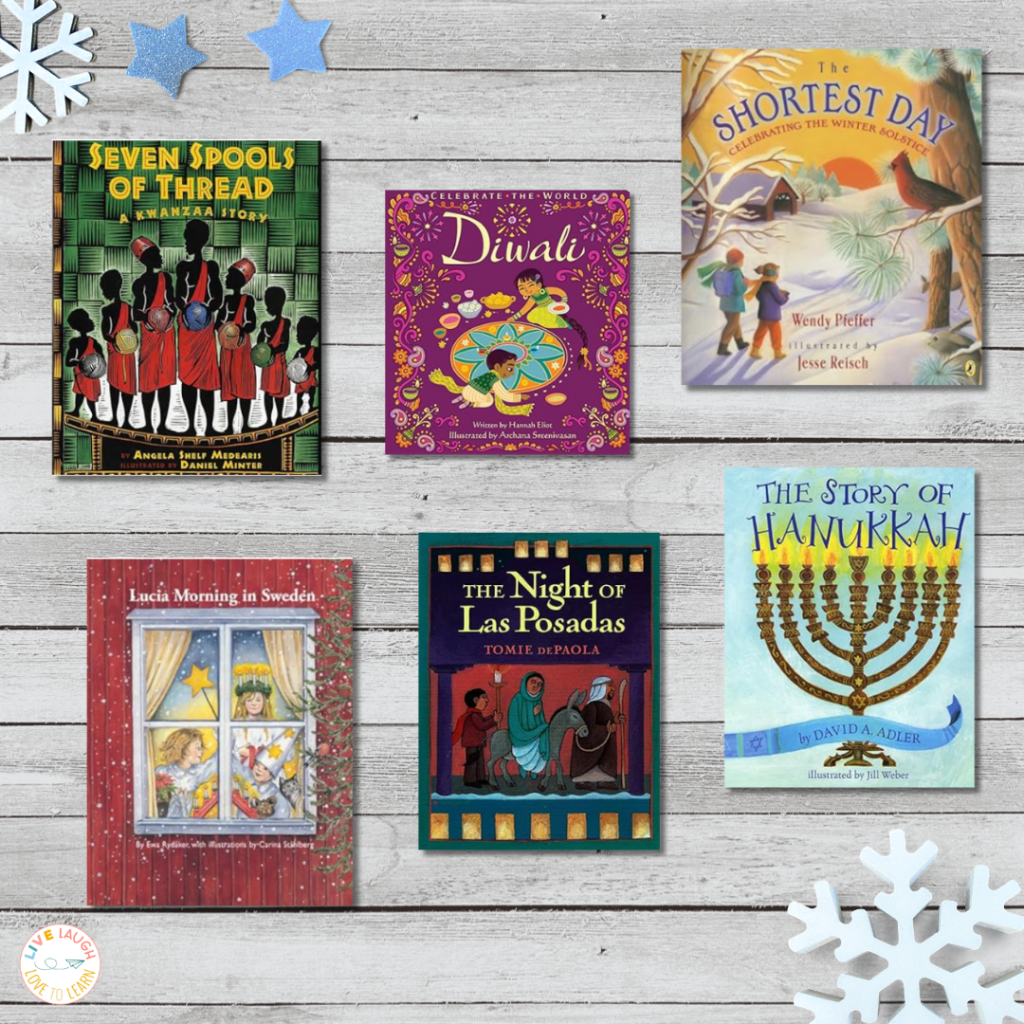 A flat lay image featuring six children's books used for holidays around the world activities: Seven Spools of Thread (Kwanzaa), Diwali, The Shortest Day (Winter Solstice), Lucia Morning in Sweden, The Night of Las Posadas, and The Story of Hanukkah. The books are arranged on a light wooden background with blue and white snowflake decorations