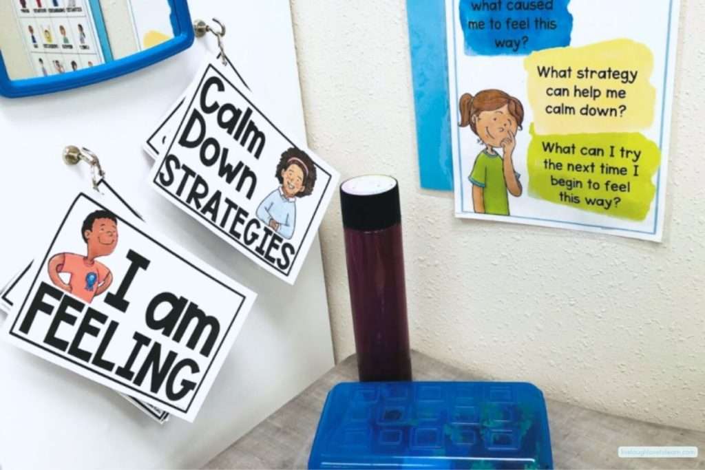 Calm down corner classroom setup with feeling cards and calm down strategies for student self-regulation