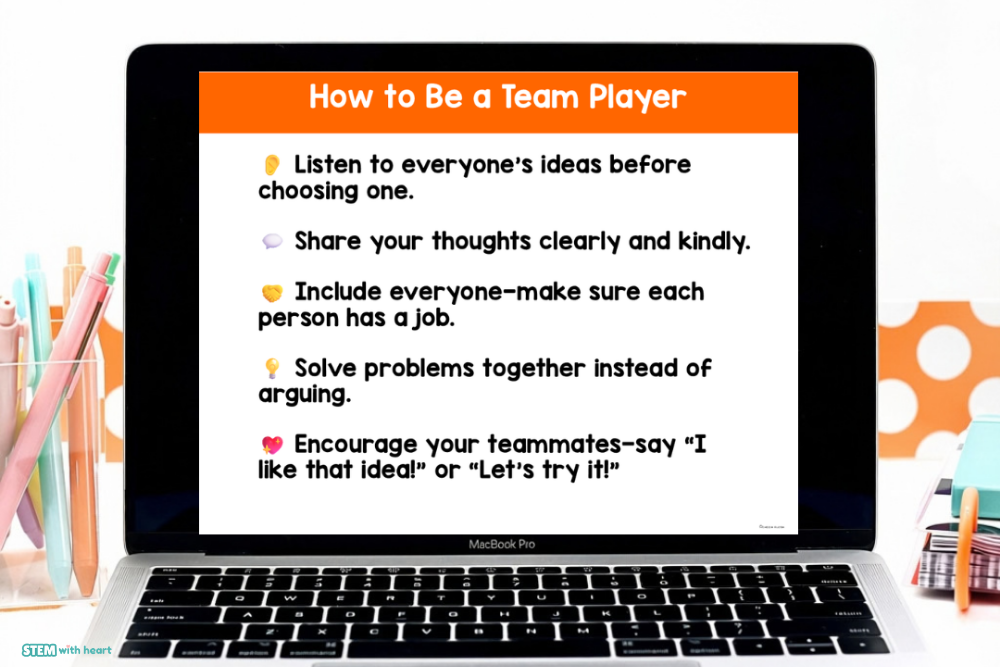 STEM teamwork mini-lesson displayed on a laptop, teaching students to listen to ideas, communicate kindly, include teammates, solve problems, and encourage others.